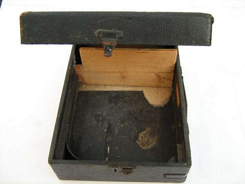 gramophone box and 6 records.