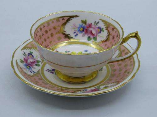 PARAGON VINTAGE DUSTY PINK AND GOLD TEA CUP AND SAUCER WITH CABBAGE ROSES.