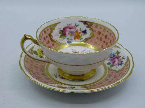 PARAGON VINTAGE DUSTY PINK AND GOLD TEA CUP AND SAUCER WITH CABBAGE ROSES.