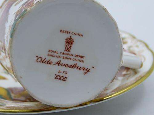 ROYAL CROWN DERBY DEMI TASSE AND SAUCER HAND PAINTED IN THE OLDE AVESBURY PATTERN A 73.
