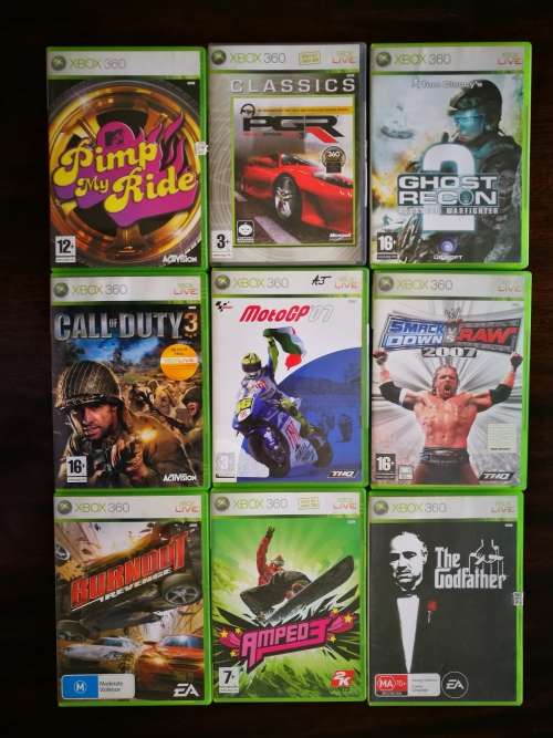 2 x Xbox 360 Consoles ++ 3 Remotes ++ 9 Games ++ Extras