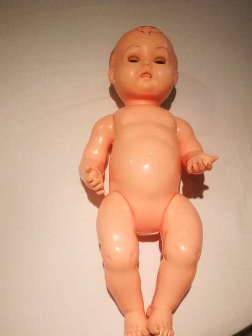Vintage Doll with dress - good condition