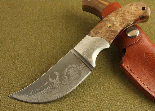 Browning African Hunting Knife with leather sheath.