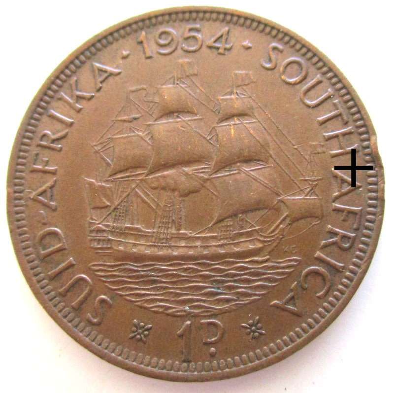 A 1954 SOUTH AFRICA PENNY---Very good detail but has a curl on the rim