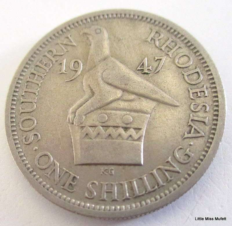 A 1947 RHODESIAN 1 SHILLING---XF