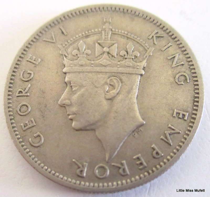 A 1947 RHODESIAN 1 SHILLING---XF