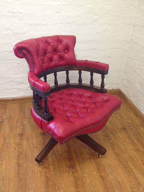 Antique red leather swivel office chair