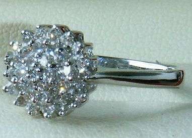 ***R29 450***  STUNNING 9CT WHITE GOLD .50 CARAT DIAMOND CLUSTER RING SIZE O
