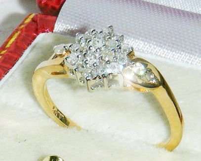 9CT YELLOW GOLD .25 CARAT DIAMOND LADIES RING SIZE N