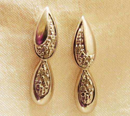 SOLID STERLING SILVER AND REAL DIAMOND EARRINGS