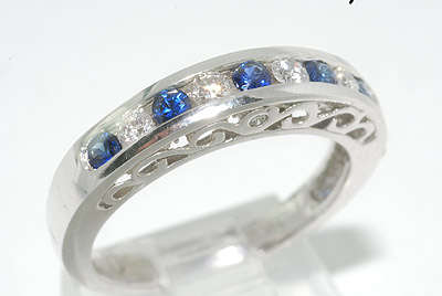 **R 12 580** 0.70CT 11 STONE SAPPHIRE & DIAMOND WEDDING BAND VS