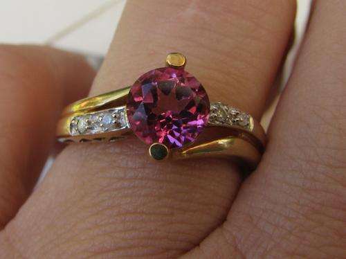 9ct yellow gold topaz and diamond eternity ring. Size 7
