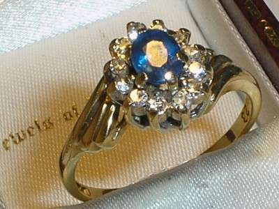 ***R22 000*** 9CT GOLD REAL SAPPHIRE & .25CT DIAMOND CLUSTER RING - O