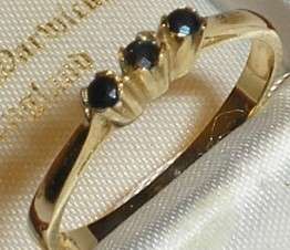 ***R6 000*** 9CT GOLD REAL SAPPHIRE TRILOGY RING SIZE