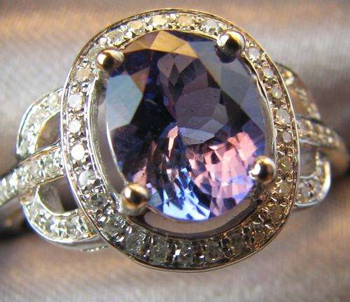 ***MONEY-BACK GUARANTEE*** 2.60ct Diamond and Tanzanite ring set in 14Kt YG Ring
