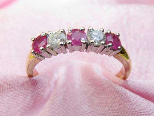 ***R22 700*** 9CT GOLD RUBY & DIAMOND ETERNITY RING