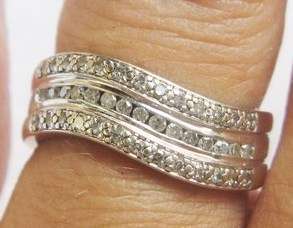 A FINE 9CT WHITE GOLD .40 CARAT DIAMOND ETERNITY RING SIZE M