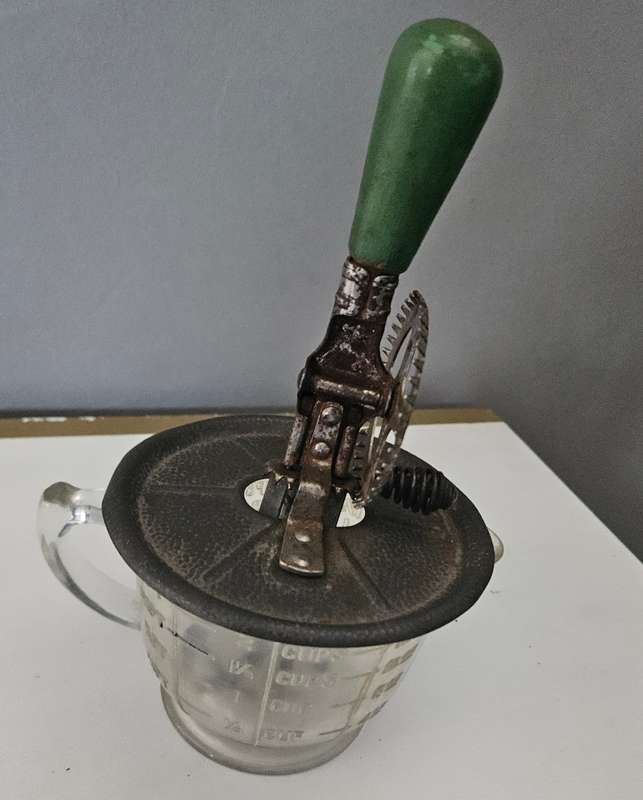 Vintage beater in jug