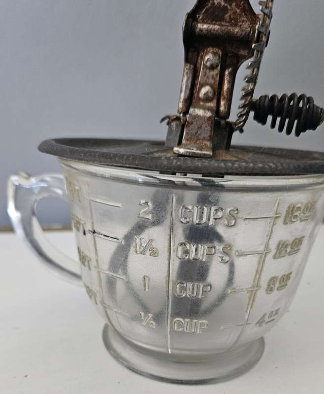 Vintage beater in jug