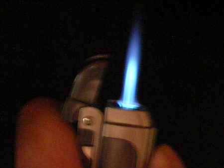 MULTIFUNCTION LIGHTER WITH BOTTLE OPENER CORK SCREW ETC.