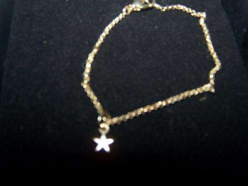 Cute gold tone bracelet originally from Dorothy Perkins