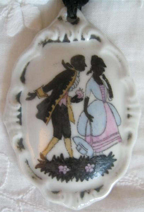 HANDPAINTED SILOUETTE, VINTAGE PORCELAIN CHOCKER, WITH BLACK VELVET RIBBON.