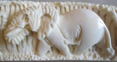 MAJESTIC ELEPHANT TUSK, BEAUTIFULLY HAND CARVED WITH LARGE AND SMALLER ELEPHANT.