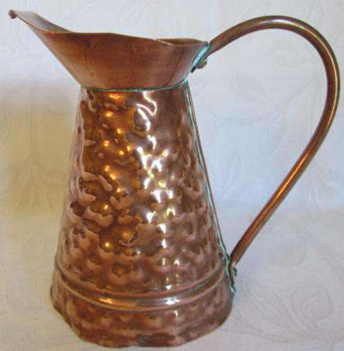 OLD, SMALL COPPER JUG, HAND BEATEN IN MORE WAYS THAN ONE !!