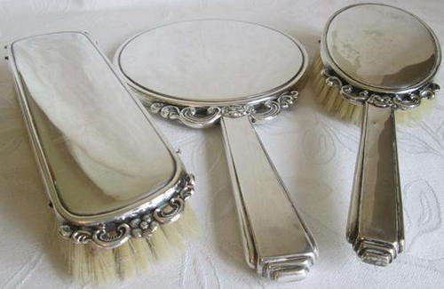 SILVER PLATED DRESSING TABLE SET, ART DECO DESIGN, TWO BRUSHES AND A HAND MIRROR