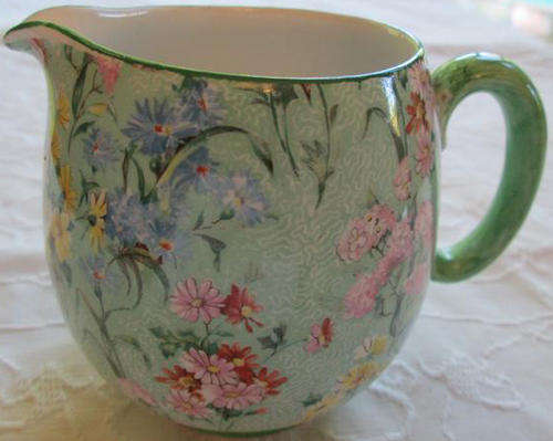 VINTAGE, SHELLY ENGLAND, CREAMER DECORATED IN THE MELODY DESIGN.