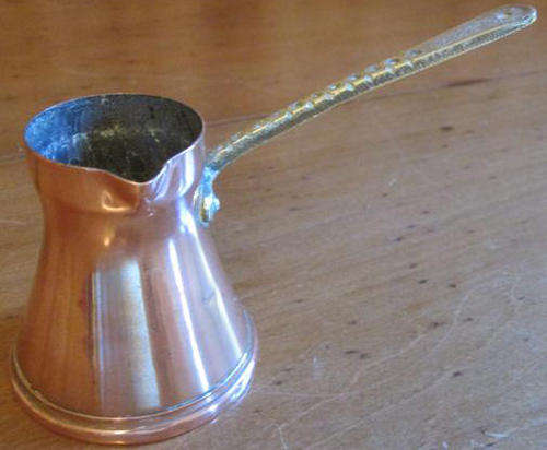 SMALL VINTAGE COPPER POT WITH A POURING SPOUT, USED WHEN MAKING TURKISH, GREEK AND ARABIC COFFEE.