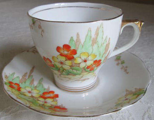 VINTAGE, ROSLYN, ENGLISH BONE CHINA, HAND PAINTED CUP AND SAUCER IN AUTUMNAL SHADES