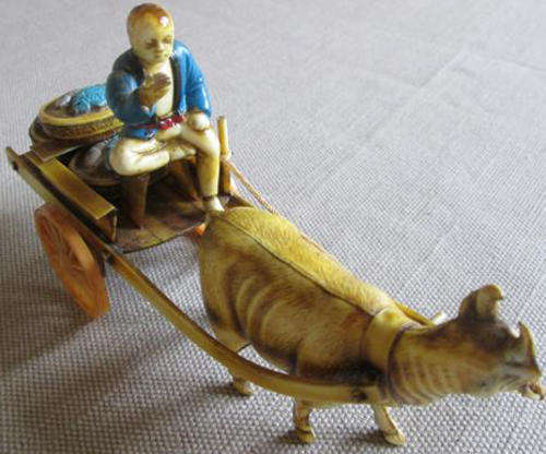 VINTAGE, CELLULOID, JAPANESE FISHERMAN, WITH HIS CATCH OF THE DAY, OX AND WAGON.