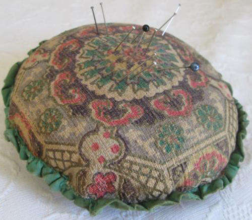 ANTIQUE FABRIC, SAWDUST FILLED, PIN CUSHION
