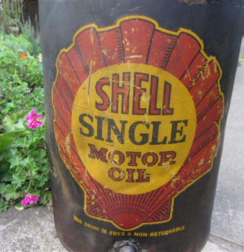 YOU ARE WELCOME TO MAKE ME AN OFFER...  LARGE  ALMOST ANTIQUE, SHELL SINGLE OIL CAN WITH WORKING TAP