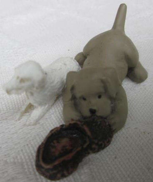 CUTE AND PLAYFULL PUPPY CHEWING A MANS SLIPPER !!.