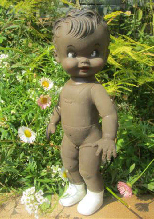 VINTAGE AND CUTE, A LITTLE BLACK BABY DOLL, MADE FROM RUBBER.