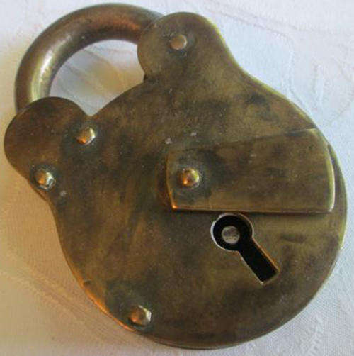 GENUINE ANTIQUE BRASS PADLOCK WITH A SLIDING KEY HOLE COVER, FOUND IN A FARM SHED.......