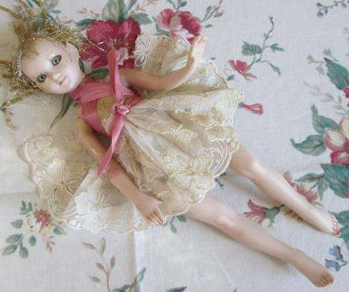 ENCHANTING PORCELAIN FAIRY DOLL WITH BEADED HAIR