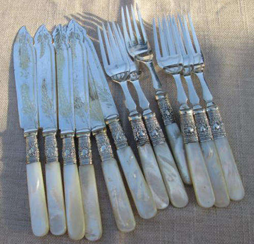 VINTAGE SILVER PLATED FISH KNIVES AND FORKS WITH MOTHER OF PEARL  HANDLES