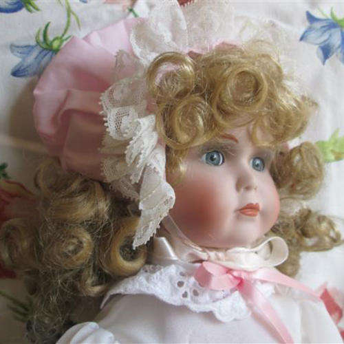 VINTAGE DRESSED DOLL, PORCELAIN HEAD, ARMS, LEGS, FABRIC BODY