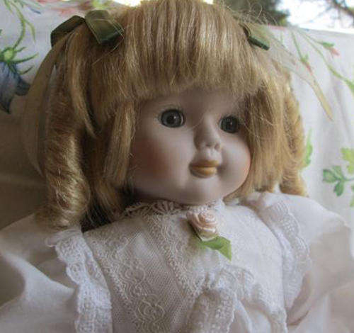 VINTAGE DRESSED DOLL, PORCELAIN HEAD, ARMS, LEGS, FABRIC BODY