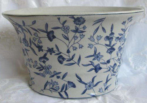 VINTAGE OVAL SHAPED BLUE AND WHITE PORCELAIN BOWL, FLORAL DESIGN.