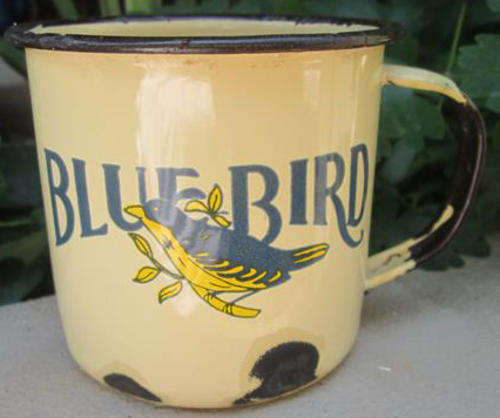VINTAGE ENAMEL MUG WITH AN ADVERT FOR BLUEBIRD ??