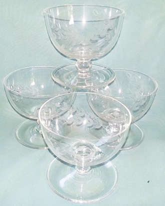 Set of 4 matching vintage sweet/dessert glasses with saucer attached, cut leaf design.