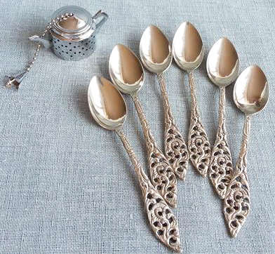 SET OF 6 x MATCHING SILVER TONE TEA SPOONS WITH PRETTY HANDLES.,