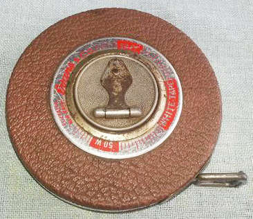 VINTAGE EVANS and CO 50 FOOT TAPE MEASURE, MADE IN ELIZABETH, NEW JERSEY