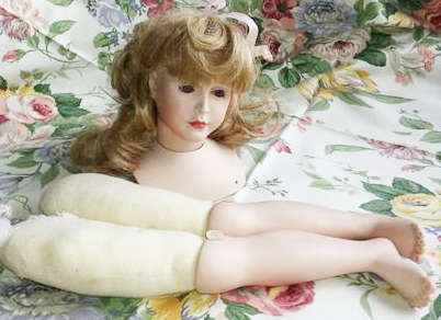 PORCELAIN DOLLS HEAD AND OTHER BODY PARTS