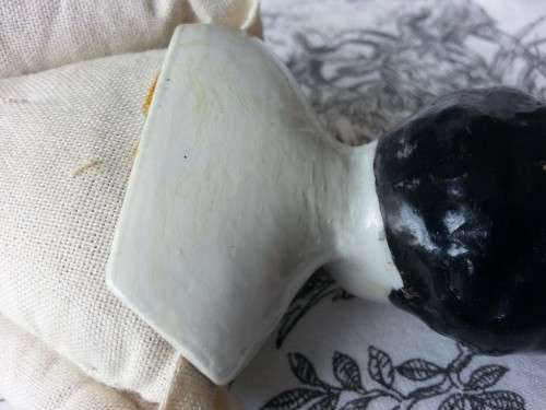 ANTIQUE, BLACK BERTHA ,PORCELAIN HEAD DOLL, LEGS AND ARMS PORCELAIN, SHE HAS A CLOTH BODY.