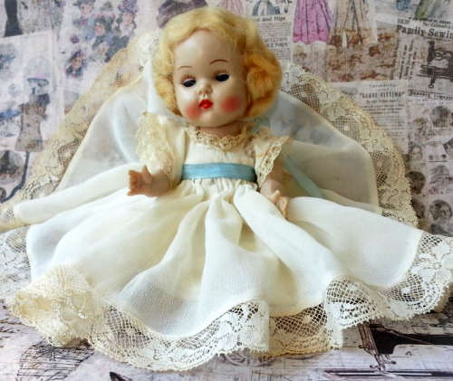 VINTAGE ROSEBUD BABY DOLL, BLONDE MOHAIR WIG, BLUE OPEN / SHUT EYES, ORIGINAL CLOTHING.